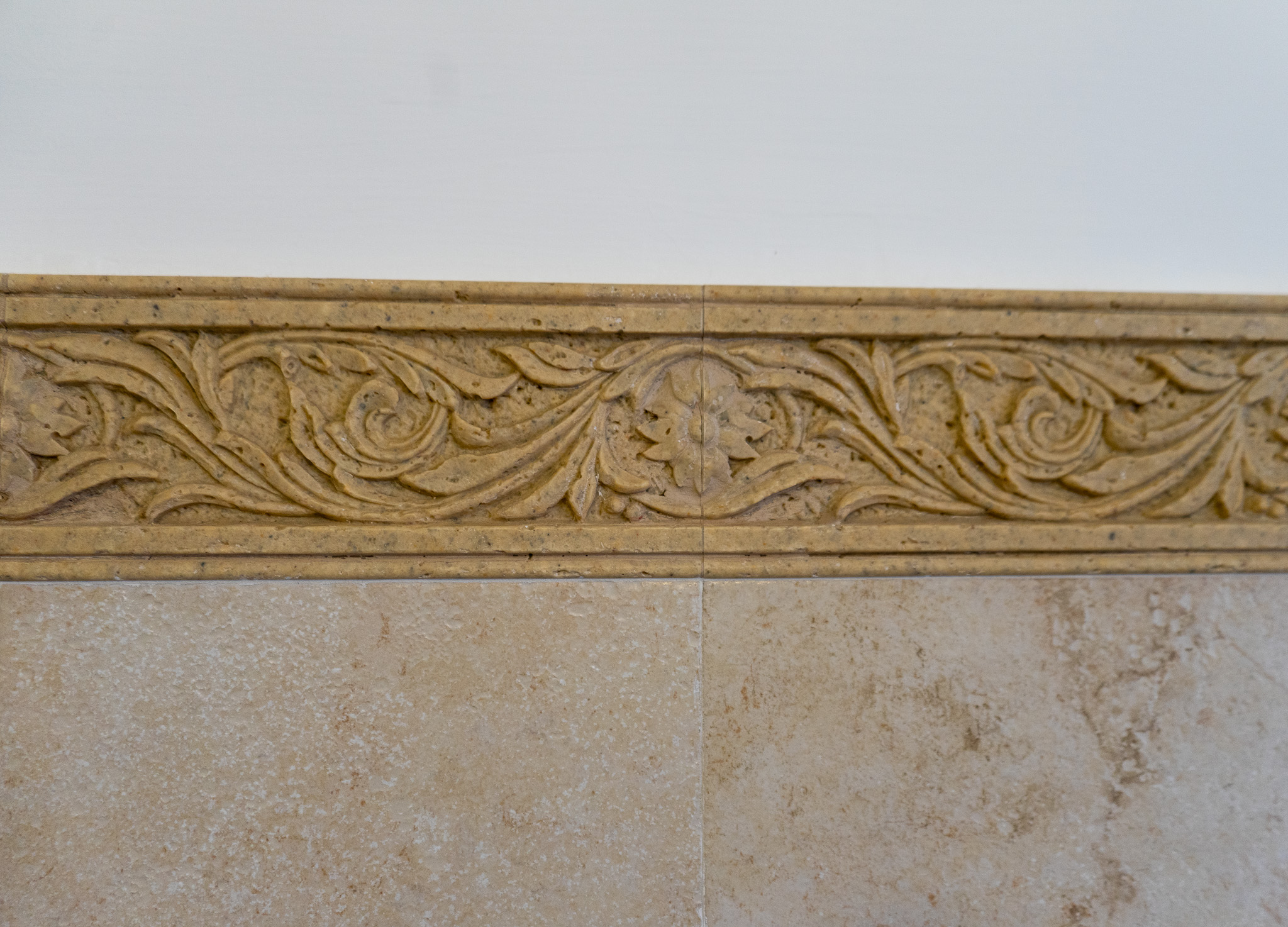 Carved marble border bathroom Emerald apartment Venice - traditional Venetian stonework detail