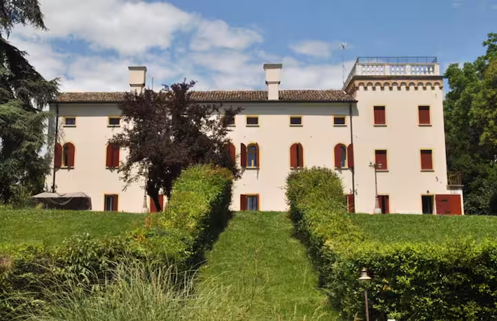 La Torre di Rua exterior from garden - medieval tower UNESCO Prosecco Hills San Pietro di Feletto